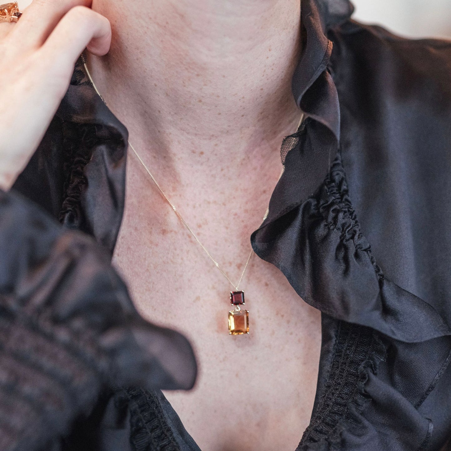 Model wearing Octagon Gold Necklace in Garnet & Citrine
