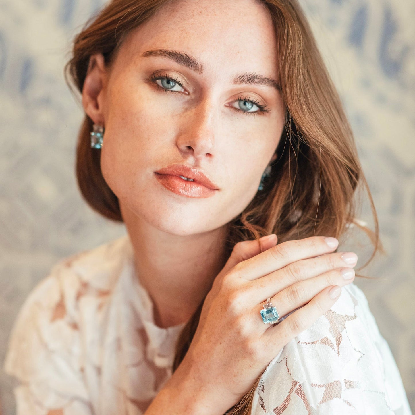 Model wearing blue topaz jewellery | The Andalusian Collection | Augustine Jewels | Gemstone Jewellery